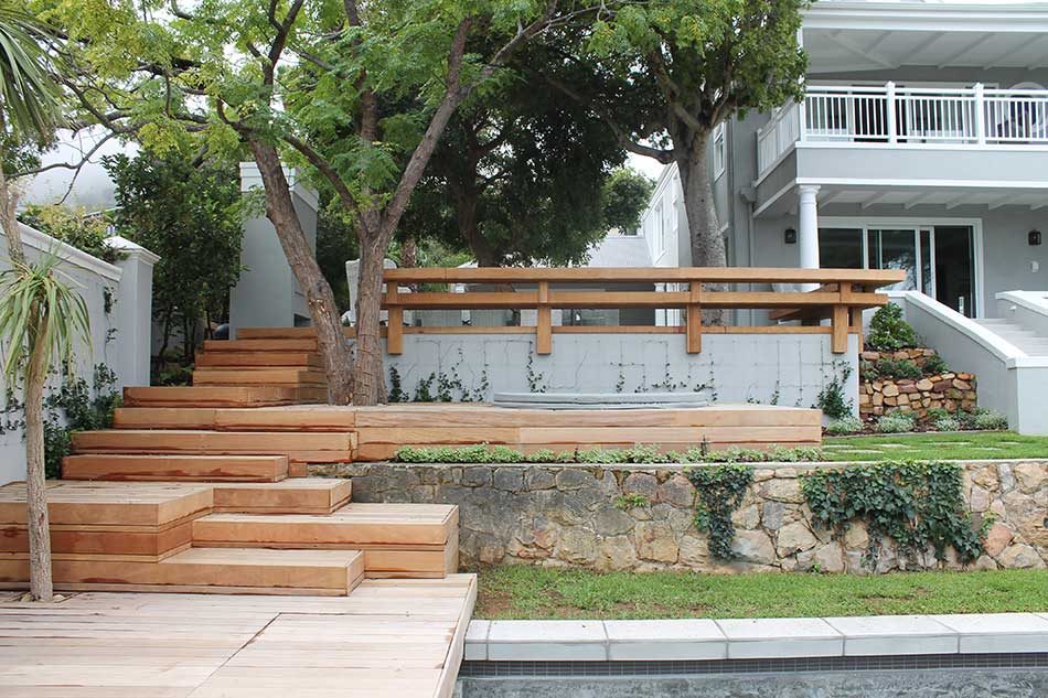 Board-walk-01-ll-Decking-ll-Jasmine-trellis-ll-Stone-retaining-ll-Tropical-garden-ll-hardscape-ll-